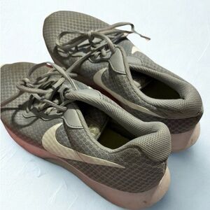 Nike Gray Sneakers with Mesh Upper and Cushioned Sole